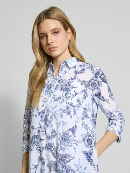 Emily Van Den Bergh -Blue and White Floral Dress