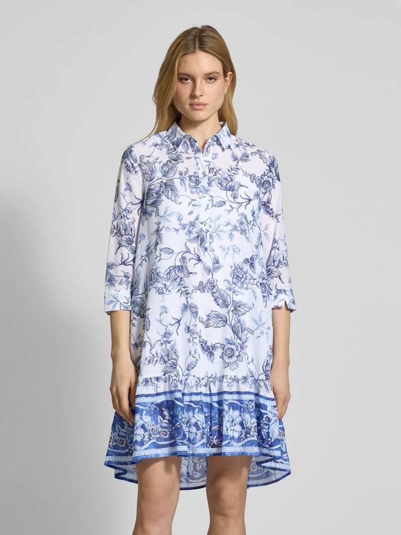 Emily Van Den Bergh -Blue and White Floral Dress